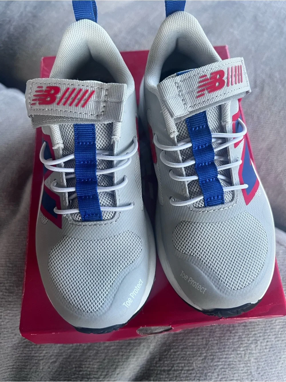 New Balance Kids White Sneakers with Blue & Pink Accents